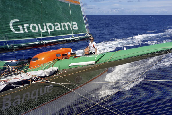 Stan Honey at the wheel of Groupama 3