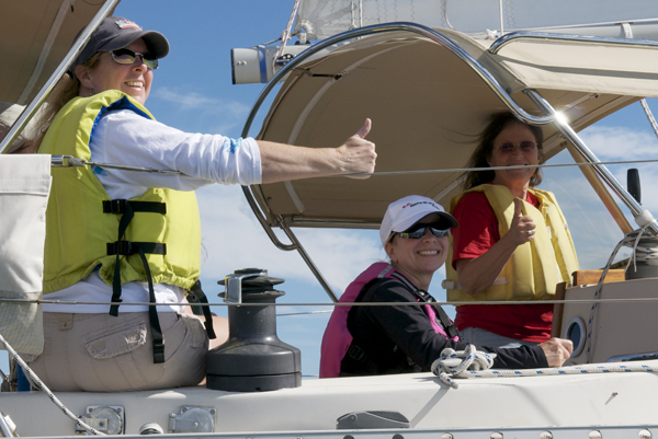 three ladies aboard Interlude